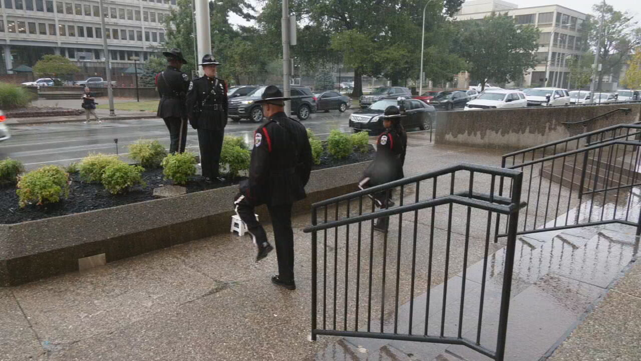 LMPD officers prepare to raise US flag at new headquarters